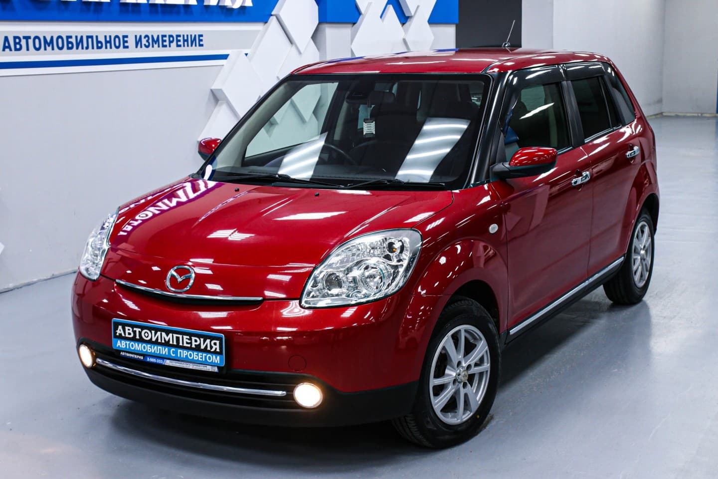 Mazda Verisa 3